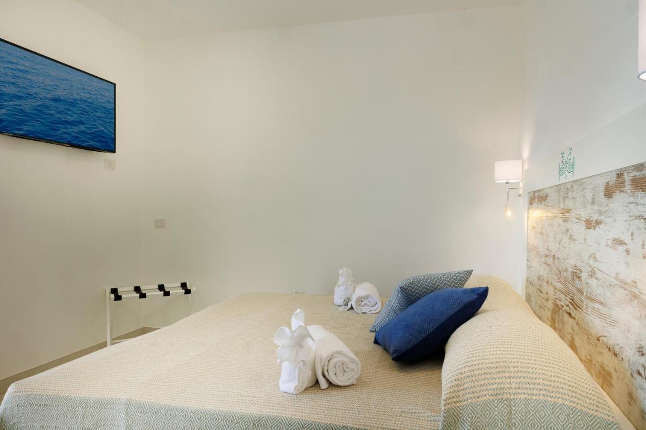 Mercury Beach Hotel Sant'Antioco Bagian luar foto