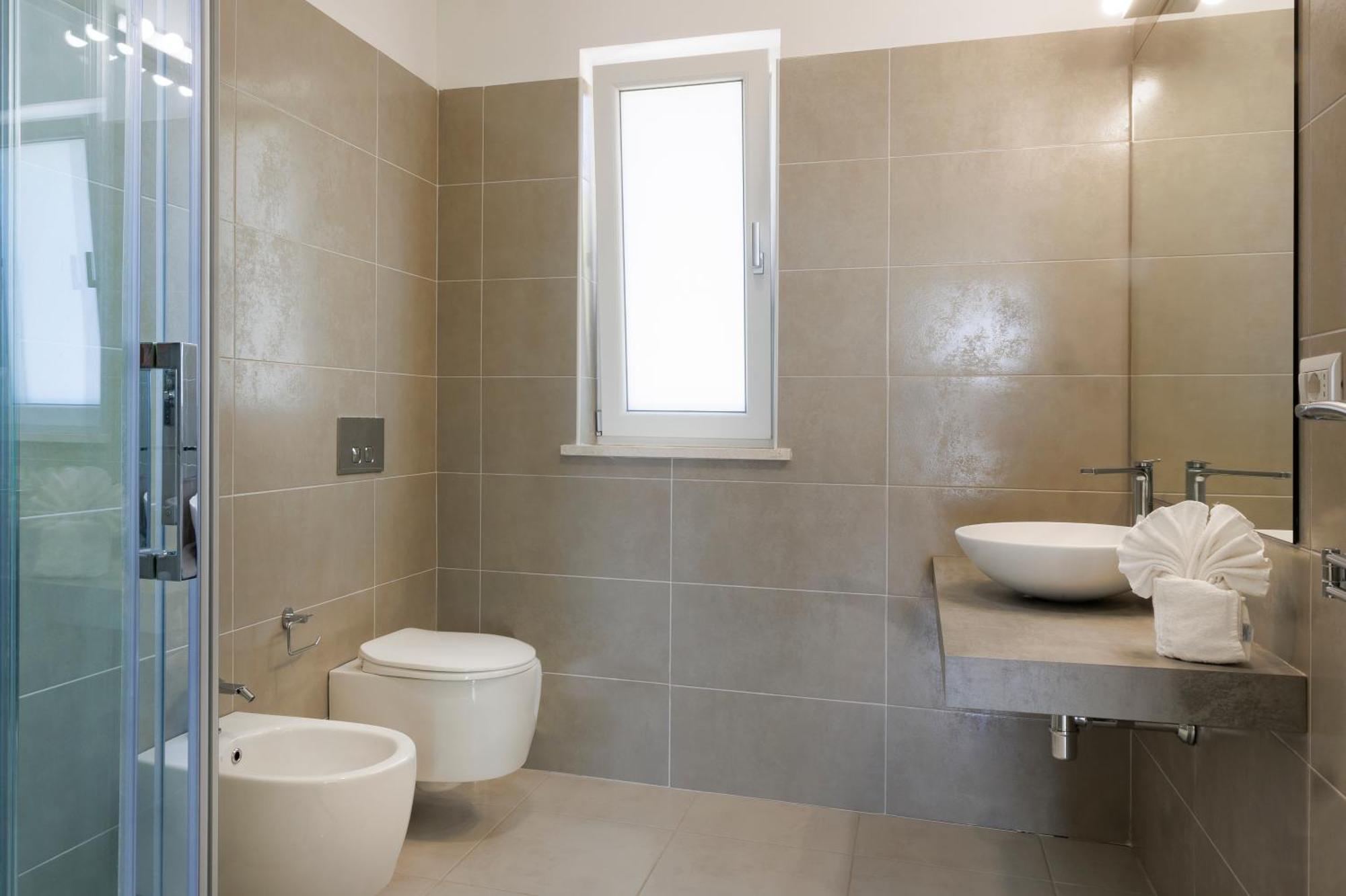 Mercury Beach Hotel Sant'Antioco Bagian luar foto